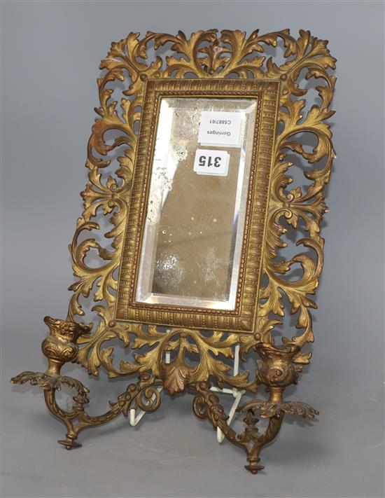 A Victorian gilt metal two sconce wall mirror, W.24cm, H.40cm.